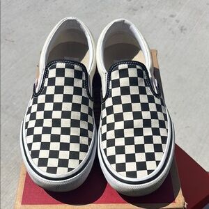 Vans Black and White Checkerboard Slip-On Sneakers
